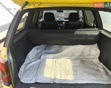 Желтый Опель Астра, объемом двигателя 1.8 л и пробегом 300 тыс. км за 1100 $, фото 13 на Automoto.ua