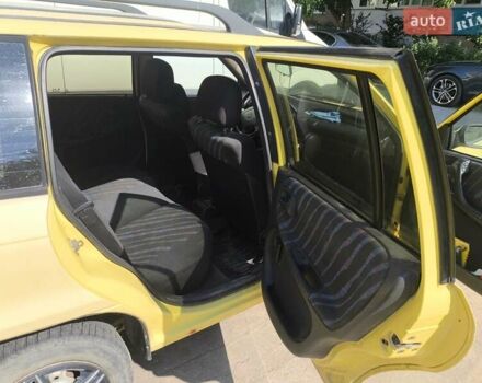 Желтый Опель Астра, объемом двигателя 1.8 л и пробегом 300 тыс. км за 1100 $, фото 12 на Automoto.ua