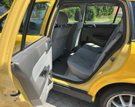 Жовтий Опель Астра, об'ємом двигуна 1.2 л та пробігом 220 тис. км за 2200 $, фото 5 на Automoto.ua