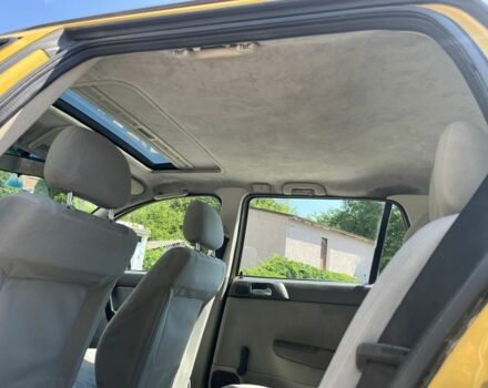 Жовтий Опель Астра, об'ємом двигуна 1.2 л та пробігом 220 тис. км за 2200 $, фото 10 на Automoto.ua