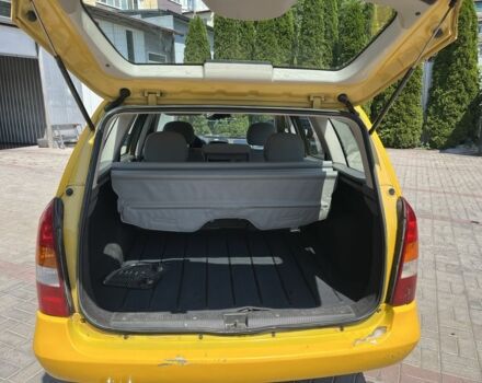 Жовтий Опель Астра, об'ємом двигуна 1.2 л та пробігом 220 тис. км за 2200 $, фото 6 на Automoto.ua