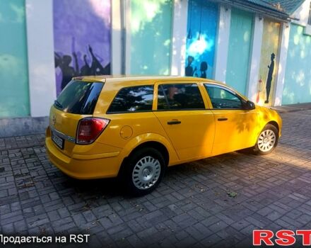 Желтый Опель Астра, объемом двигателя 1.7 л и пробегом 315 тыс. км за 5000 $, фото 3 на Automoto.ua