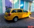 Желтый Опель Астра, объемом двигателя 1.7 л и пробегом 315 тыс. км за 5000 $, фото 3 на Automoto.ua