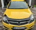 Желтый Опель Астра, объемом двигателя 1.7 л и пробегом 316 тыс. км за 4099 $, фото 1 на Automoto.ua