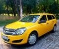 Желтый Опель Астра, объемом двигателя 1.7 л и пробегом 315 тыс. км за 5000 $, фото 1 на Automoto.ua