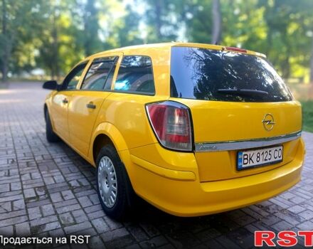 Желтый Опель Астра, объемом двигателя 1.7 л и пробегом 315 тыс. км за 5000 $, фото 4 на Automoto.ua