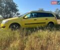 Желтый Опель Астра, объемом двигателя 1.7 л и пробегом 290 тыс. км за 5800 $, фото 6 на Automoto.ua