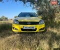 Желтый Опель Астра, объемом двигателя 1.7 л и пробегом 290 тыс. км за 5800 $, фото 1 на Automoto.ua