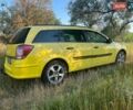 Желтый Опель Астра, объемом двигателя 1.7 л и пробегом 290 тыс. км за 5800 $, фото 5 на Automoto.ua