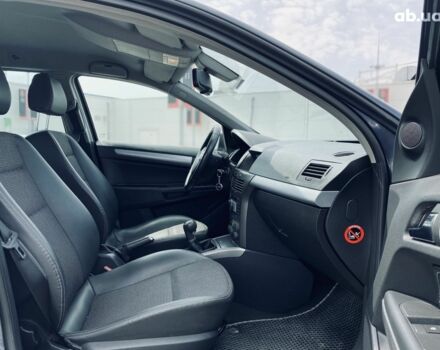 Серый Опель Астра, объемом двигателя 1.8 л и пробегом 231 тыс. км за 5400 $, фото 12 на Automoto.ua