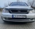 Серый Опель Астра, объемом двигателя 2 л и пробегом 406 тыс. км за 2600 $, фото 1 на Automoto.ua