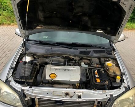 Серый Опель Астра, объемом двигателя 1.4 л и пробегом 195 тыс. км за 3100 $, фото 8 на Automoto.ua