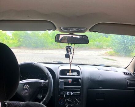 Серый Опель Астра, объемом двигателя 1.4 л и пробегом 195 тыс. км за 3100 $, фото 6 на Automoto.ua