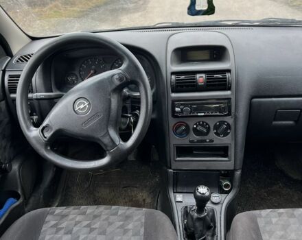 Серый Опель Астра, объемом двигателя 1.6 л и пробегом 240 тыс. км за 870 $, фото 4 на Automoto.ua