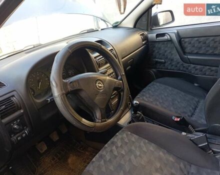 Серый Опель Астра, объемом двигателя 1.6 л и пробегом 193 тыс. км за 3400 $, фото 13 на Automoto.ua