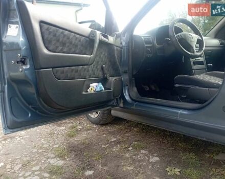 Серый Опель Астра, объемом двигателя 1.6 л и пробегом 193 тыс. км за 3400 $, фото 25 на Automoto.ua