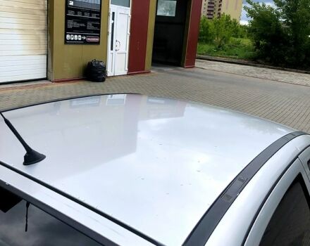 Серый Опель Астра, объемом двигателя 1.4 л и пробегом 195 тыс. км за 3100 $, фото 4 на Automoto.ua