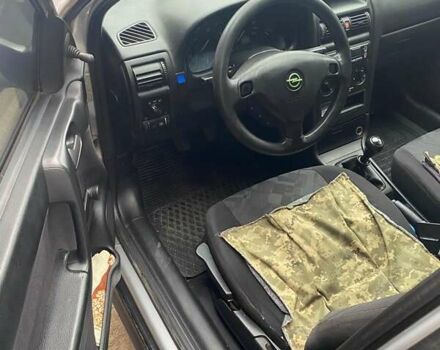 Серый Опель Астра, объемом двигателя 1.7 л и пробегом 197 тыс. км за 1500 $, фото 5 на Automoto.ua