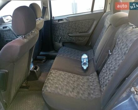 Серый Опель Астра, объемом двигателя 1.6 л и пробегом 193 тыс. км за 3400 $, фото 11 на Automoto.ua