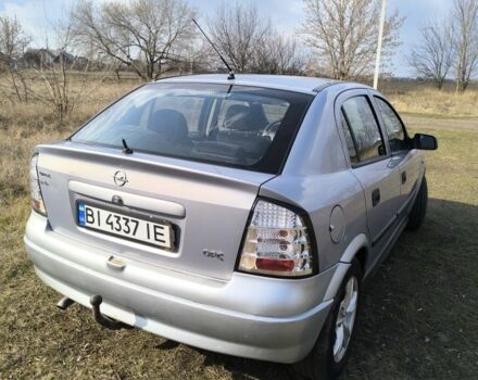 Серый Опель Астра, объемом двигателя 2 л и пробегом 269 тыс. км за 3700 $, фото 2 на Automoto.ua