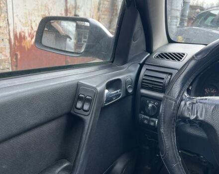 Серый Опель Астра, объемом двигателя 1.6 л и пробегом 368 тыс. км за 1183 $, фото 7 на Automoto.ua