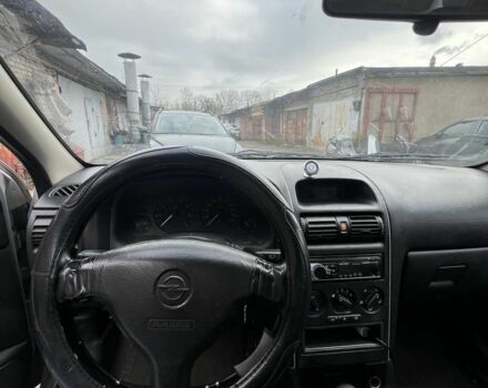 Серый Опель Астра, объемом двигателя 1.6 л и пробегом 368 тыс. км за 1183 $, фото 5 на Automoto.ua