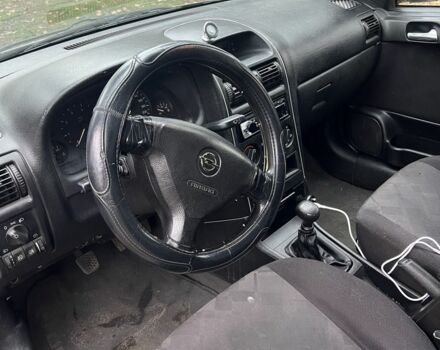 Серый Опель Астра, объемом двигателя 1.6 л и пробегом 368 тыс. км за 1650 $, фото 8 на Automoto.ua