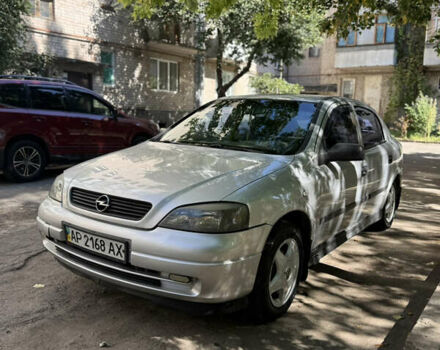 Серый Опель Астра, объемом двигателя 1.4 л и пробегом 283 тыс. км за 2450 $, фото 2 на Automoto.ua