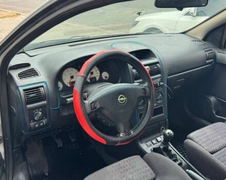 Серый Опель Астра, объемом двигателя 1.8 л и пробегом 300 тыс. км за 1199 $, фото 8 на Automoto.ua