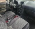 Серый Опель Астра, объемом двигателя 2 л и пробегом 300 тыс. км за 980 $, фото 7 на Automoto.ua