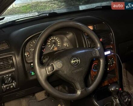 Серый Опель Астра, объемом двигателя 1.6 л и пробегом 453 тыс. км за 2000 $, фото 15 на Automoto.ua