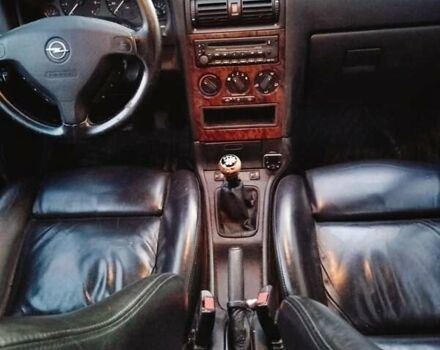 Серый Опель Астра, объемом двигателя 1.6 л и пробегом 268 тыс. км за 3800 $, фото 6 на Automoto.ua