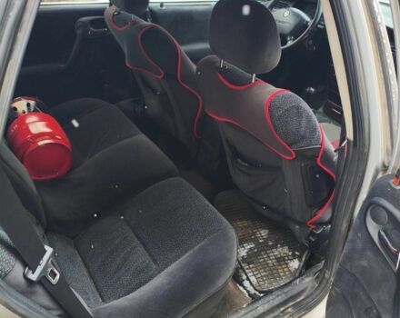 Серый Опель Астра, объемом двигателя 2 л и пробегом 250 тыс. км за 1432 $, фото 1 на Automoto.ua