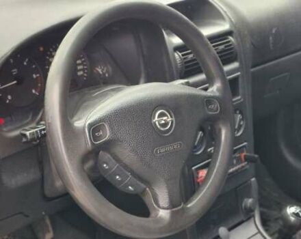 Серый Опель Астра, объемом двигателя 1.7 л и пробегом 170 тыс. км за 1900 $, фото 12 на Automoto.ua