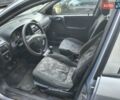 Серый Опель Астра, объемом двигателя 2 л и пробегом 333 тыс. км за 3400 $, фото 2 на Automoto.ua