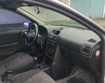 Серый Опель Астра, объемом двигателя 2 л и пробегом 200 тыс. км за 3000 $, фото 9 на Automoto.ua