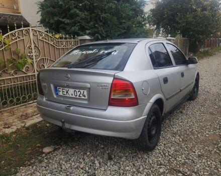 Серый Опель Астра, объемом двигателя 2 л и пробегом 300 тыс. км за 980 $, фото 3 на Automoto.ua