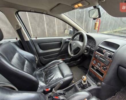 Серый Опель Астра, объемом двигателя 1.69 л и пробегом 327 тыс. км за 2500 $, фото 8 на Automoto.ua