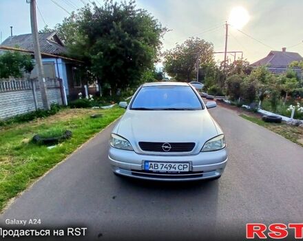Серый Опель Астра, объемом двигателя 1.6 л и пробегом 205 тыс. км за 1800 $, фото 2 на Automoto.ua