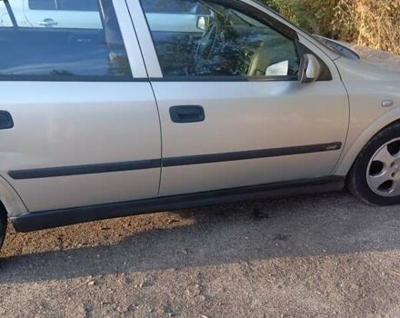 Серый Опель Астра, объемом двигателя 1.6 л и пробегом 337 тыс. км за 1771 $, фото 2 на Automoto.ua