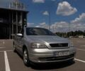 Серый Опель Астра, объемом двигателя 2 л и пробегом 306 тыс. км за 2400 $, фото 1 на Automoto.ua
