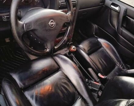 Серый Опель Астра, объемом двигателя 1.6 л и пробегом 268 тыс. км за 3800 $, фото 8 на Automoto.ua