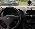 Серый Опель Астра, объемом двигателя 2 л и пробегом 306 тыс. км за 2400 $, фото 14 на Automoto.ua