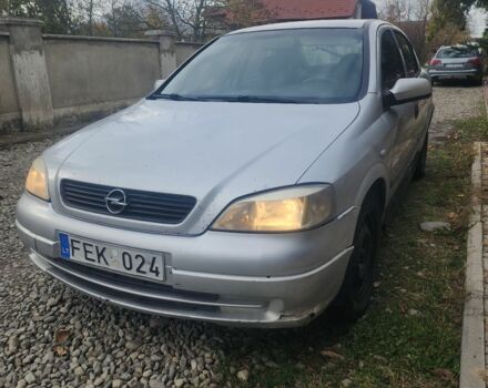 Серый Опель Астра, объемом двигателя 2 л и пробегом 300 тыс. км за 980 $, фото 2 на Automoto.ua