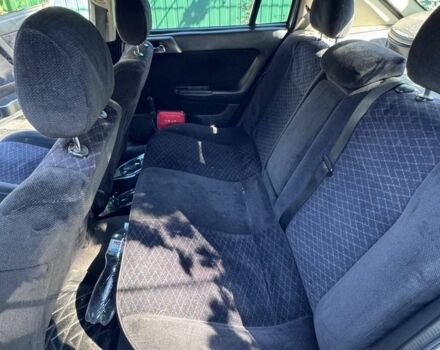 Серый Опель Астра, объемом двигателя 2 л и пробегом 360 тыс. км за 3600 $, фото 4 на Automoto.ua