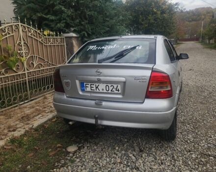 Серый Опель Астра, объемом двигателя 2 л и пробегом 300 тыс. км за 980 $, фото 4 на Automoto.ua