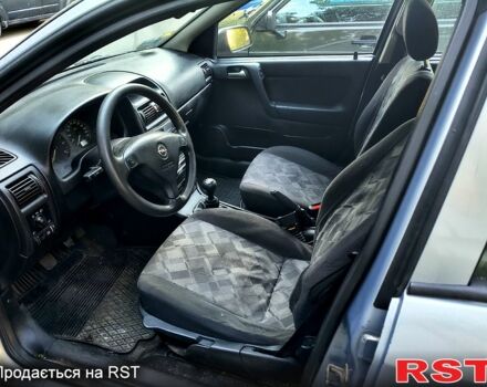 Серый Опель Астра, объемом двигателя 2 л и пробегом 320 тыс. км за 3400 $, фото 3 на Automoto.ua