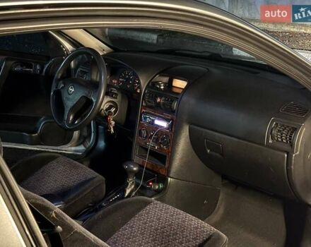 Серый Опель Астра, объемом двигателя 1.6 л и пробегом 453 тыс. км за 2000 $, фото 16 на Automoto.ua