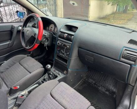 Серый Опель Астра, объемом двигателя 1.8 л и пробегом 300 тыс. км за 1199 $, фото 10 на Automoto.ua