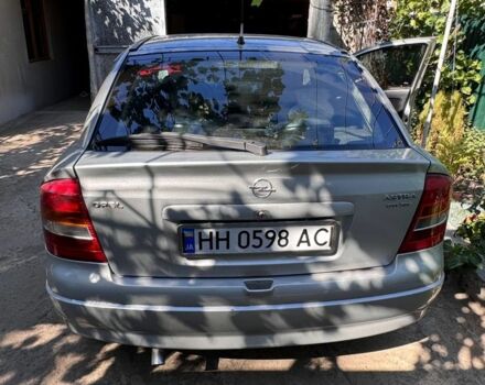 Серый Опель Астра, объемом двигателя 2 л и пробегом 360 тыс. км за 3600 $, фото 3 на Automoto.ua